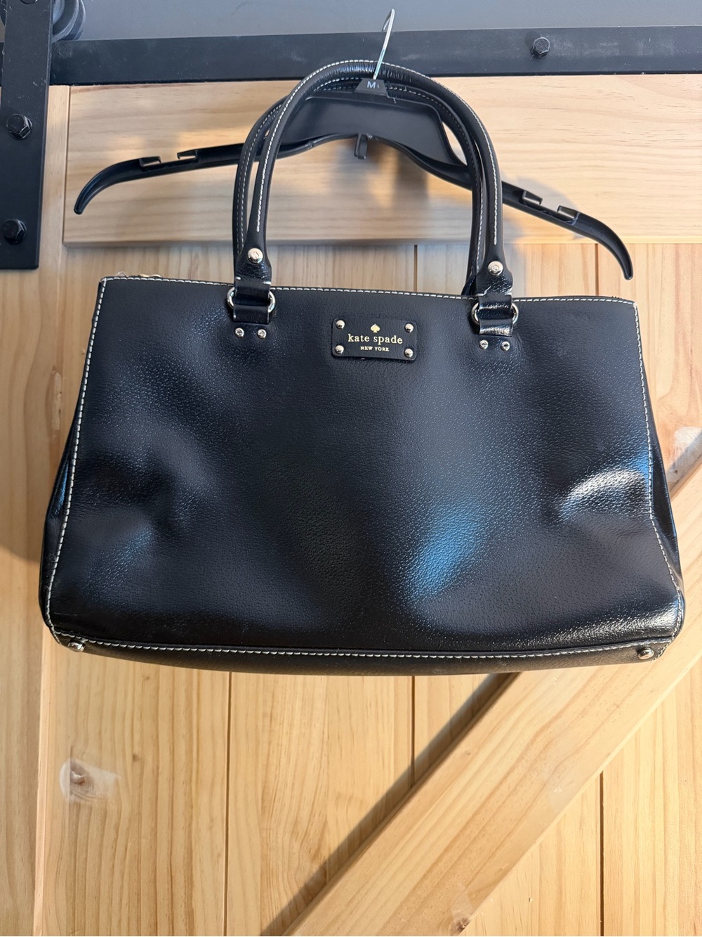kate spade black leather satchel with white stitch